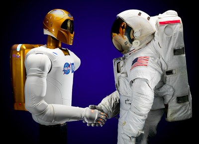 Robonaut and astronaut
